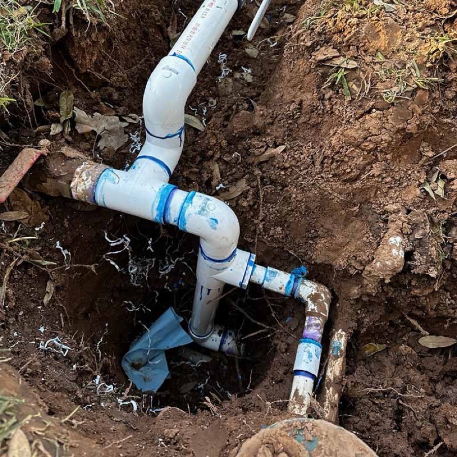 Residential plumbing lines installed below ground